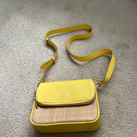 kate spade Handbags - Kate Spade yellow polka dot bag along with dust bag